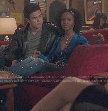Josie's blue velvet top and pearl embellished jeans on Riverdale