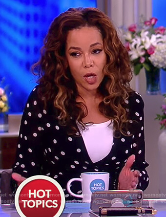 Sunny's navy polka dot wrap dress on The View