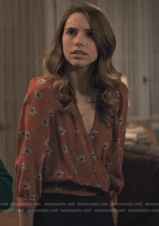 Stevie's daisy print wrap top on Madam Secretary