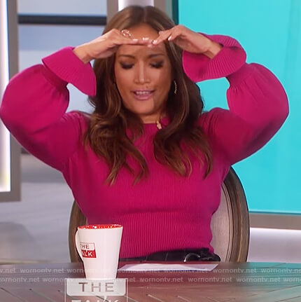 Carrie Inaba's pink flare cuff sweater on The Talk