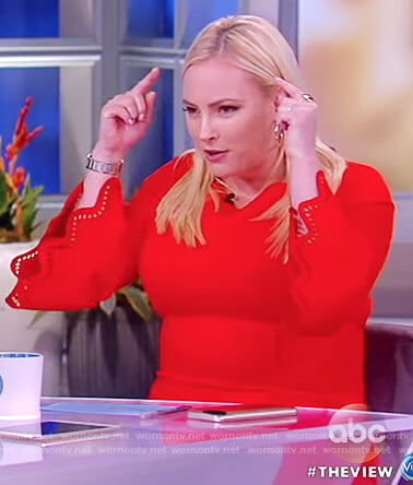 Meghan's orange lasercut bell sleeve dress on The View