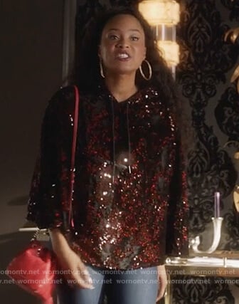 Tangey's red sequin hooded poncho on Famous in Love