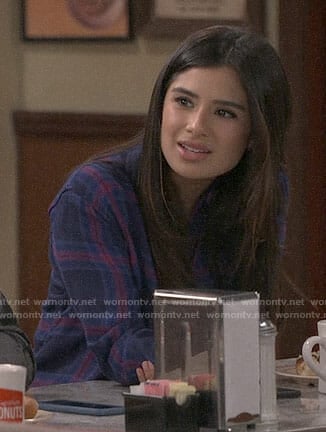 Sofia's blue and pink plaid shirt on Superior Donuts