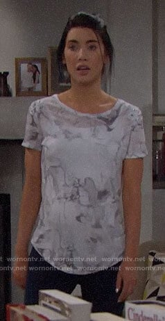 Steffy's white marbled print tee with lace-up shoulders on The Bold and the Beautiful