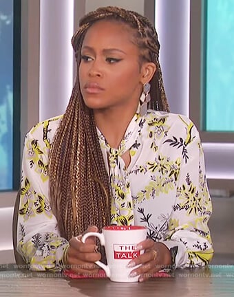 Eve's white floral print tie neck blouse on The Talk