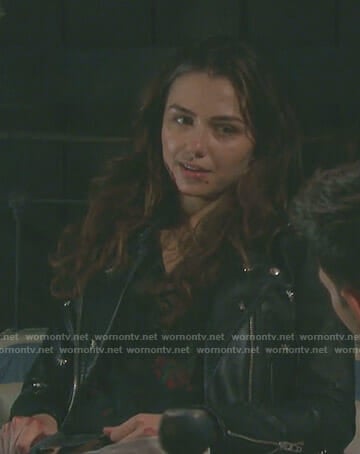 Ciara's black floral print top and dragonfly moto jacket on Days of our Lives