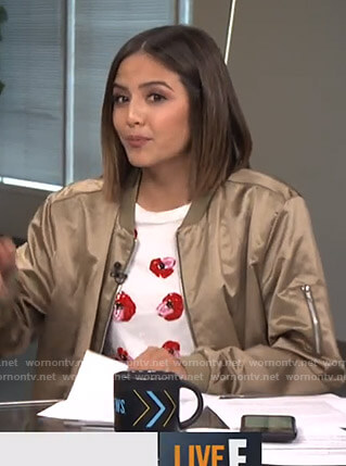 Erin's white sequin lip t shirt on Live from E!