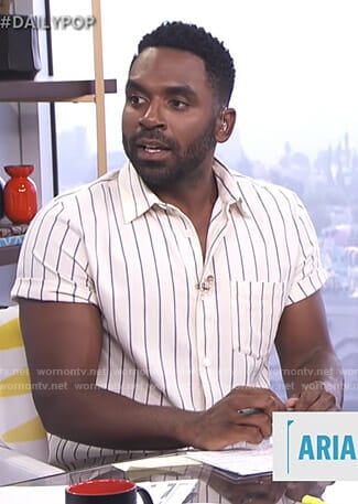 Justin's white striped short sleeve shirt on E! News Daily Pop