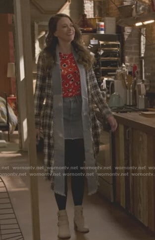 Liza's red floral top and plaid long jacket on Younger