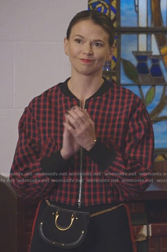 Liza's red plaid bomber jacket on Younger