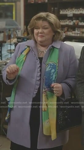 Martha's purple ruffle front coat on Good Witch