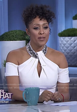 Tamera's white cold-shoulder keyhole dress on The Real