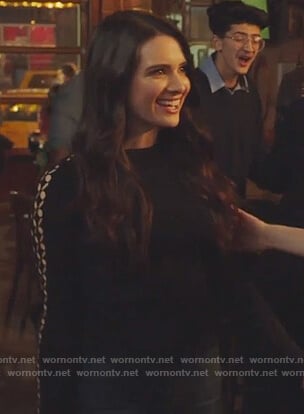 Jane's black cutout sleeves sweater on The Bold Type