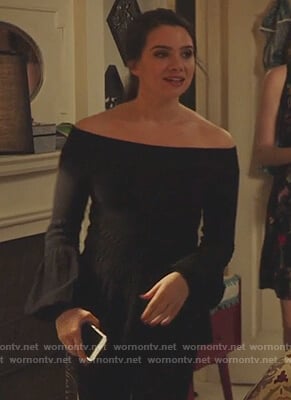 Jane's black off shoulder smocked sleeve top on The Bold Type
