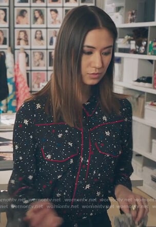 Mitzi's black star print top on The Bold Type