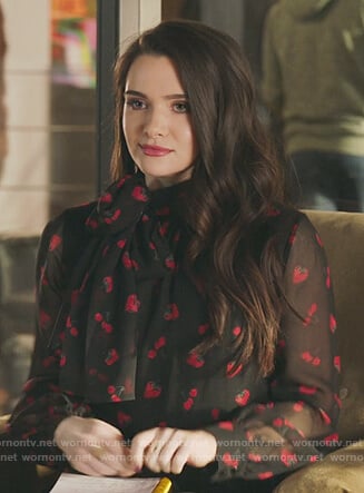 Jane's black strawberry and cherry print top and ruffled skirt on The Bold Type