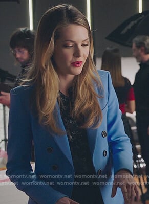 Sutton's blue button detail blazer and black floral print blouse on The Bold Type