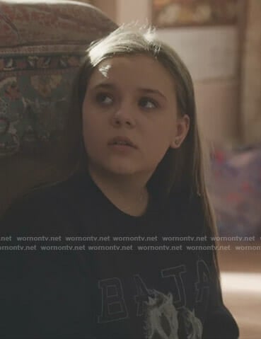 Daphne's black Baja East horse print sweatshirt on Nashville