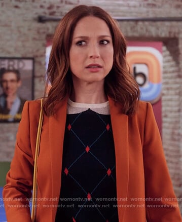 Kimmy's navy diamond sweater on Unbreakable Kimmy Schmidt