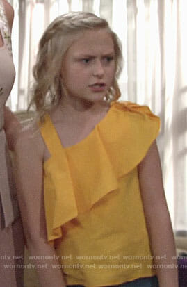 Faith's yellow ruffled top on The Young and the Restless