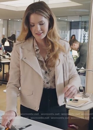 Sutton's pink floral print top and leather jacket on The Bold Type