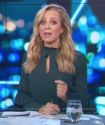 Carrie's green keyhole ruffle top on The Project