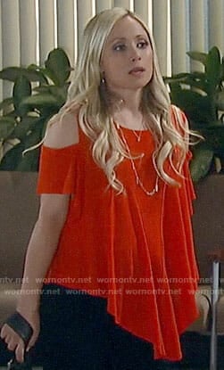 Lulu's red cold-shoulder tee on General Hospital