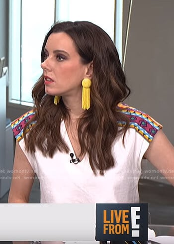 Melanie's white v-neck top with embroidery on Live from E!
