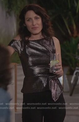 Abby's metallic asymmetric top on Girlfriends Guide to Divorce