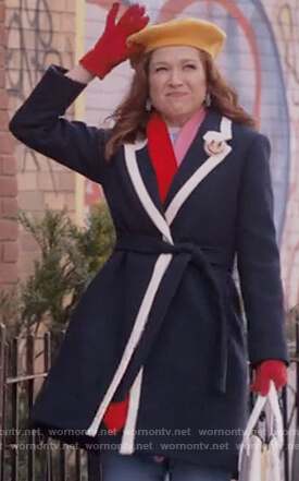 Kimmy's navy tipped coat on Unbreakable Kimmy Schmidt