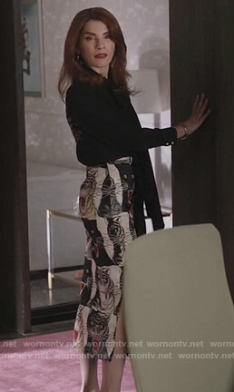 Kitty's black tie neck blouse with tiger print skirt on Dietland