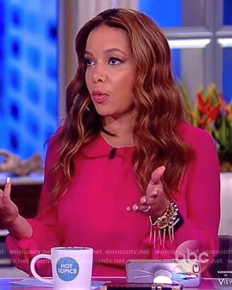 Sunny's pink long sleeve tie waist dress on The View