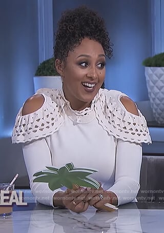 Tamera's white cold shoulder eyelet dress on The Real