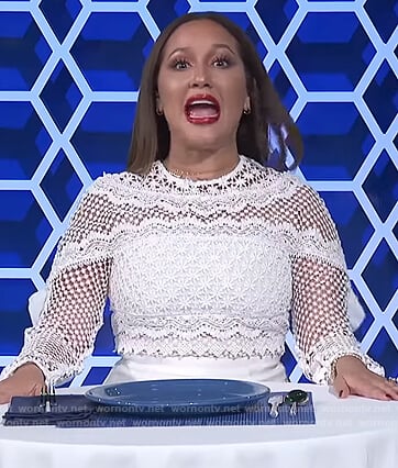 Adrienne's white lace long sleeve dress on The Real