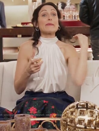 Abby's white satin halter neck top on Girlfriends Guide to Divorce