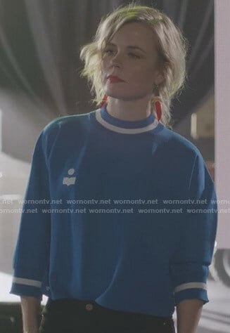 Ilse's blue cropped sweatshirt on Nashville