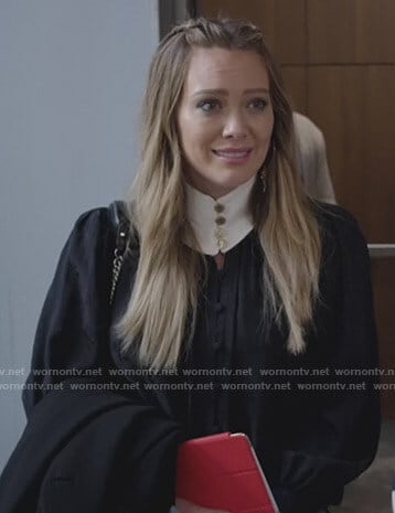 Kelsey's black contrast button neck top on Younger