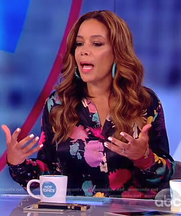 Sunny's black floral print blouse on The View