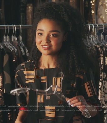 Kat's black print top on The Bold Type