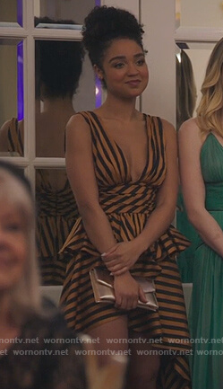 Kat's satin striped peplum top and asymmetric skirt on The Bold Type