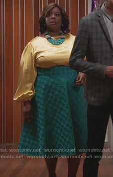 Barbara's yellow satin blouse and green print skirt on Girlfriends Guide to Divorce