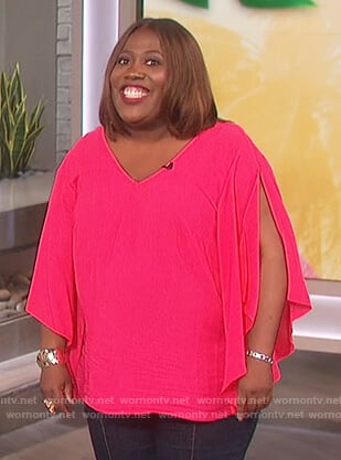 Sheryl's pink split sleeve top on The Talk