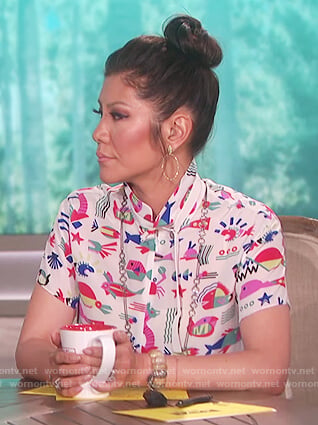 Julie's white fish print blouse on The Talk