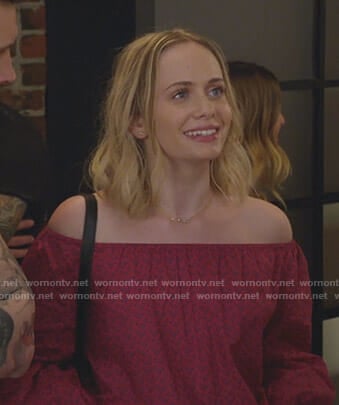 Caitlin's red floral off-shoulder top on Younger