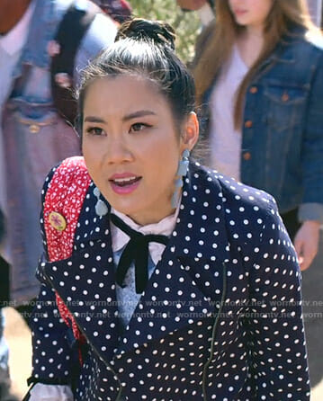 Dixie's navy polka dot moto jacket on Insatiable