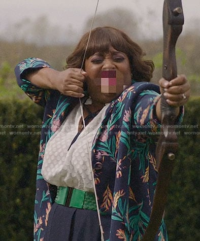 Anne's white polka dot top and floral coat on Trial and Error