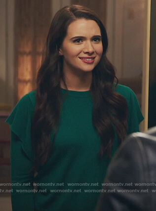 Jane's green ruffle shoulder sweater on The Bold Type