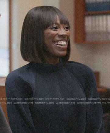 Molly's navy pleated blouse on Insecure