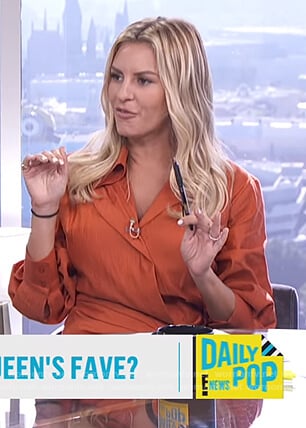 Morgan's orange wrap blouse on E! News Daily Pop