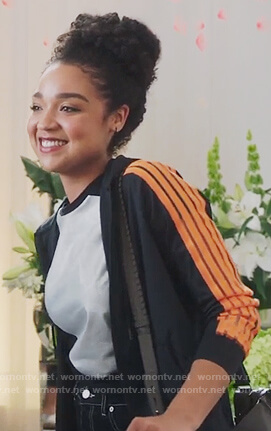 Kat's black striped sleeve hooded top on The Bold Type